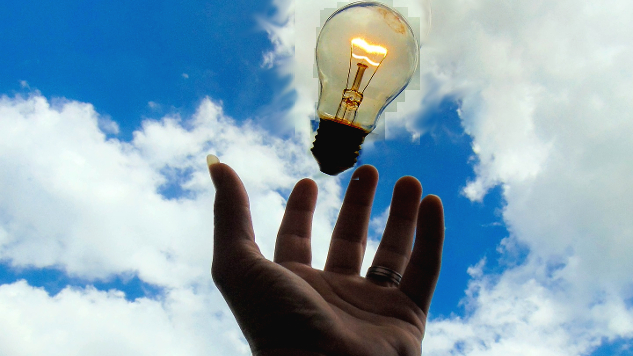 A Cheat-Sheet to Access Clarity, Compassion, and Accountability a shining lightbulb falling into an open hand